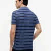 Polo de corte regular con rayas y tejido transpirable Polo de corte regular con rayas y tejido transpirable