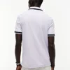 Polo de corte regular con ribetes y tejido transpirable