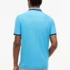 Polo de corte regular con ribetes y tejido transpirable