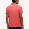 Polo de corte regular con ribetes y tejido transpirable