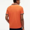 Polo de corte regular con ribetes y tejido transpirable