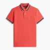 Polo de corte regular con ribetes y tejido transpirable