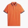 Polo de corte regular con ribetes y tejido transpirable