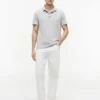 Polo de jersey con bolsillo y corte regular