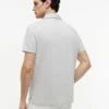 Polo de jersey con bolsillo y corte regular