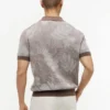Polo de manga corta con estampado tropical