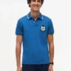 Polo de piqué con escudo monograma de corte regular Polo de piqué con escudo monograma de corte regular