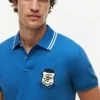 Polo de piqué con escudo monograma de corte regular Polo de piqué con escudo monograma de corte regular