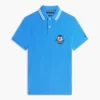 Polo de piqué con escudo monograma de corte regular Polo de piqué con escudo monograma de corte regular