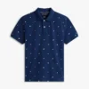 Polo de piqué con estampado de banderas en todo el cuerpo y corte regular Polo de piqué con estampado de banderas en todo el cuerpo y corte regular