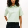 Polo de piqué con monograma en letra cursiva y corte holgado