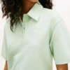 Polo de piqué con monograma en letra cursiva y corte holgado