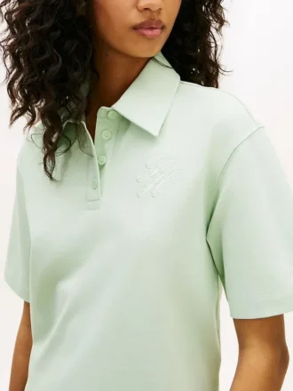Polo de piqué con monograma en letra cursiva y corte holgado