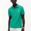 Polo de piqué con monograma en letra cursiva y corte regular