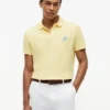 Polo de piqué con monograma en letra cursiva y corte regular
