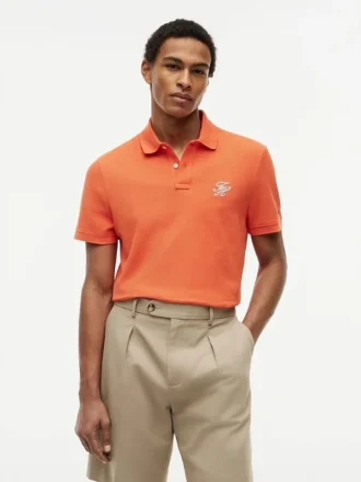 Polo de piqué con monograma en letra cursiva y corte regular