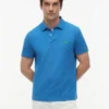 Polo de piqué con monograma en letra cursiva y corte regular