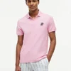 Polo de piqué con monograma en letra cursiva y corte regular