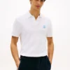 Polo de piqué con monograma en letra cursiva y corte regular