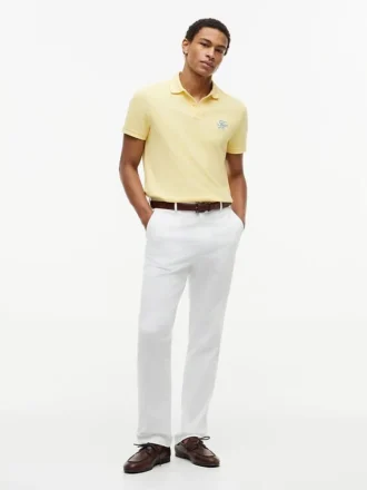 Polo de piqué con monograma en letra cursiva y corte regular