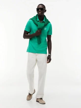 Polo de piqué con monograma en letra cursiva y corte regular