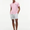 Polo de piqué con monograma en letra cursiva y corte regular