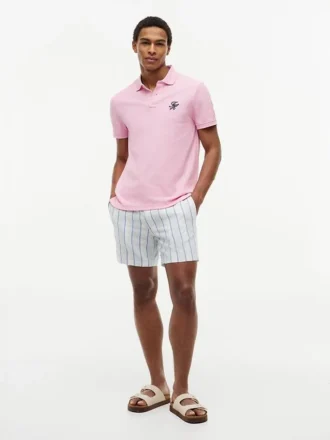 Polo de piqué con monograma en letra cursiva y corte regular