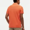 Polo de piqué con monograma en letra cursiva y corte regular