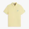 Polo de piqué con monograma en letra cursiva y corte regular