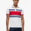 Polo de piqué elástico con rayas anchas y corte entallado Polo de piqué elástico con rayas anchas y corte entallado