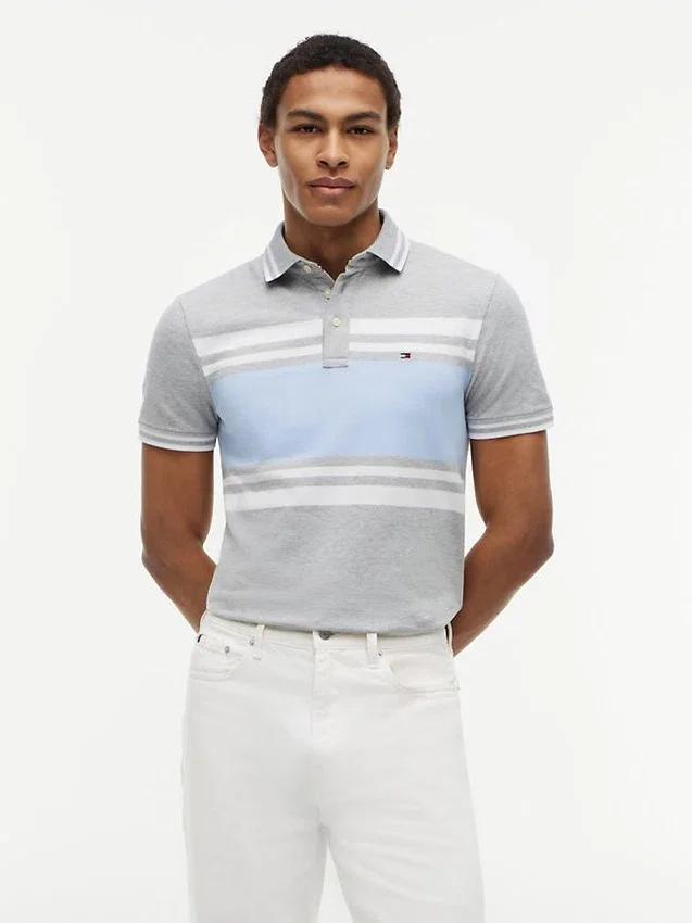 Polo de piqué elástico con rayas anchas y corte entallado Polo de piqué elástico con rayas anchas y corte entallado