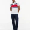Polo de piqué elástico con rayas anchas y corte entallado Polo de piqué elástico con rayas anchas y corte entallado