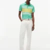 Polo de piqué elástico con rayas anchas y corte entallado Polo de piqué elástico con rayas anchas y corte entallado