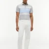 Polo de piqué elástico con rayas anchas y corte entallado Polo de piqué elástico con rayas anchas y corte entallado