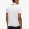 Polo de piqué elástico con rayas anchas y corte entallado Polo de piqué elástico con rayas anchas y corte entallado