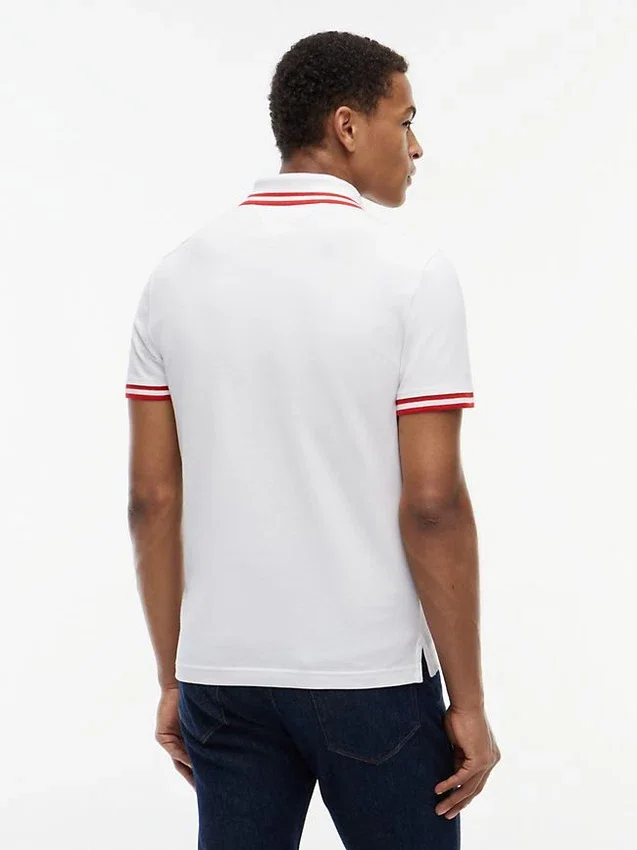 Polo de piqué elástico con rayas anchas y corte entallado Polo de piqué elástico con rayas anchas y corte entallado