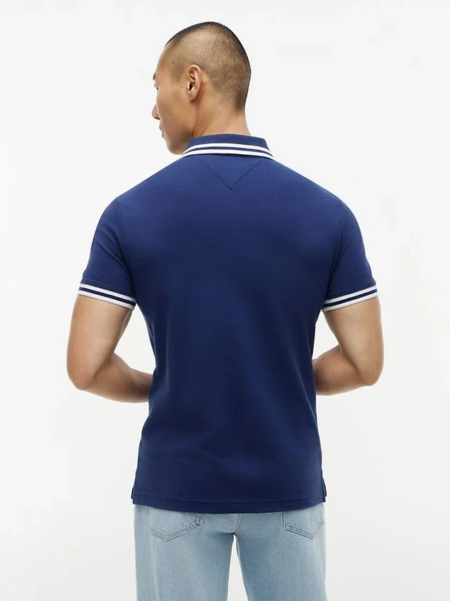Polo de piqué elástico con rayas anchas y corte entallado Polo de piqué elástico con rayas anchas y corte entallado