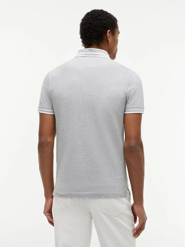 Polo de piqué elástico con rayas anchas y corte entallado Polo de piqué elástico con rayas anchas y corte entallado