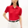 Polo de punto calado con el logotipo de la bandera por toda la prenda
