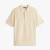 Polo de punto con textura de gofre y manga corta