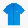 Polo de rizo con monograma en letra cursiva