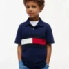Polo elástico con bandera y bloques de color para niño Polo elástico con bandera y bloques de color para niño