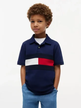 Polo elástico con bandera y bloques de color para niño