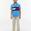Polo elástico con bandera y bloques de color para niño Polo elástico con bandera y bloques de color para niño