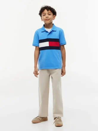 Polo elástico con bandera y bloques de color para niño
