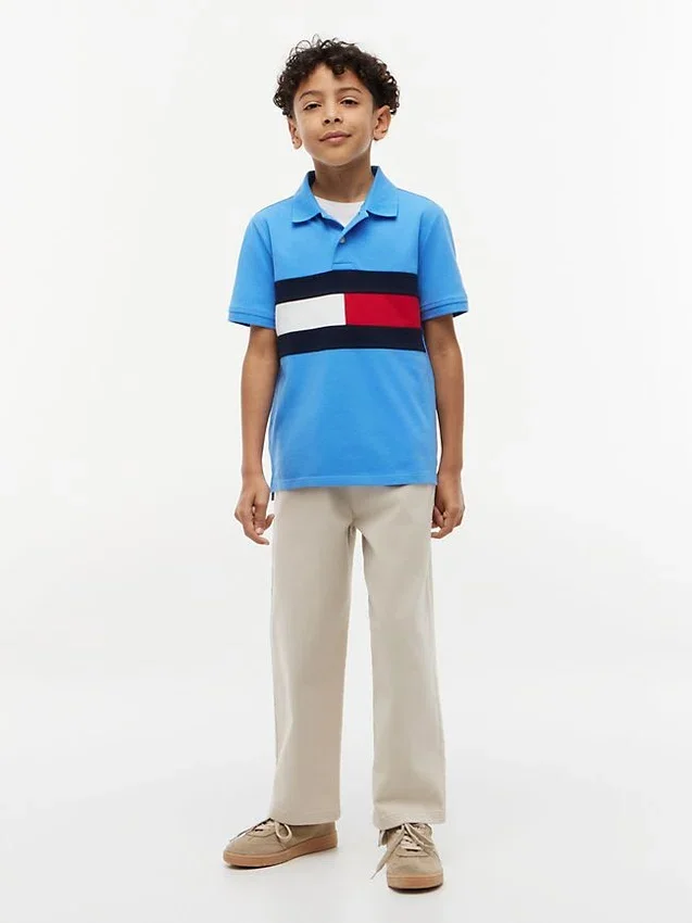 Polo elástico con bandera y bloques de color para niño Polo elástico con bandera y bloques de color para niño