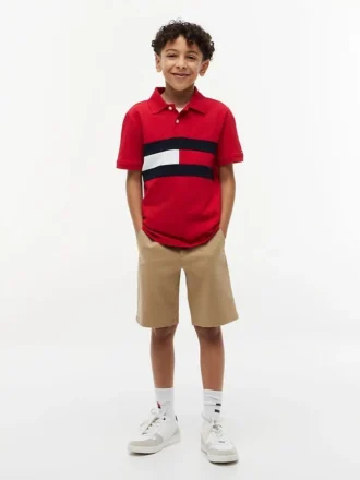 Polo elástico con bandera y bloques de color para niño