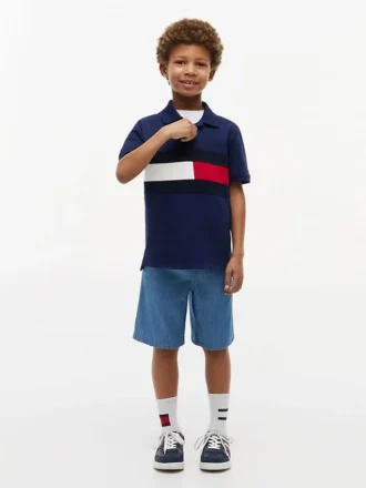 Polo elástico con bandera y bloques de color para niño