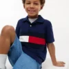 Polo elástico con bandera y bloques de color para niño Polo elástico con bandera y bloques de color para niño