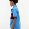 Polo elástico con bandera y bloques de color para niño Polo elástico con bandera y bloques de color para niño